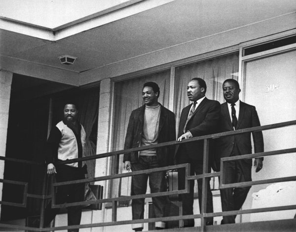 In this April 3, 1968 file photo, the Rev. Martin Luther King Jr. stands with other civil rights leaders on the balcony of the Lorraine Motel in Memphis, Tenn., a day before he was assassinated at approximately the same place.