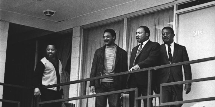 In this April 3, 1968 file photo, the Rev. Martin Luther King Jr. stands with other civil rights leaders on the balcony of the Lorraine Motel in Memphis, Tenn., a day before he was assassinated at approximately the same place.